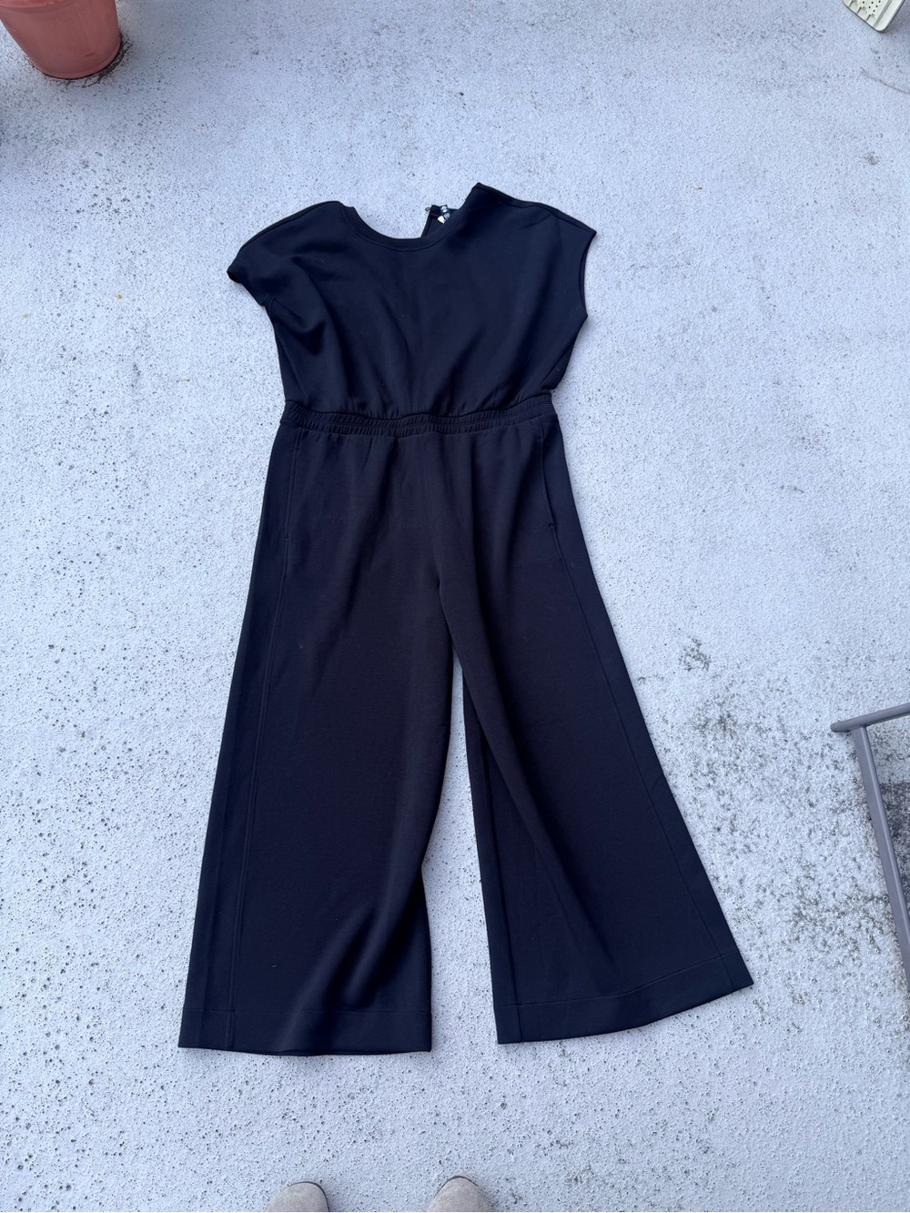 SPANX AirEssentials Cap Sleeve Cinched Jumpsuit in the shade Very Black Size 1X